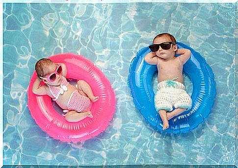 children on bathing rings