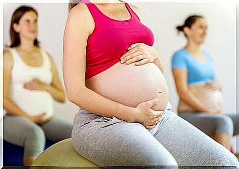 Pregnant women doing pelvic floor exercises.