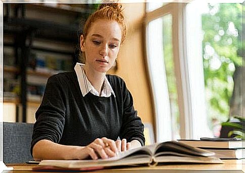 Distance education: woman with teaching materials