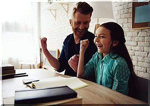 Dad and daughter doing homework