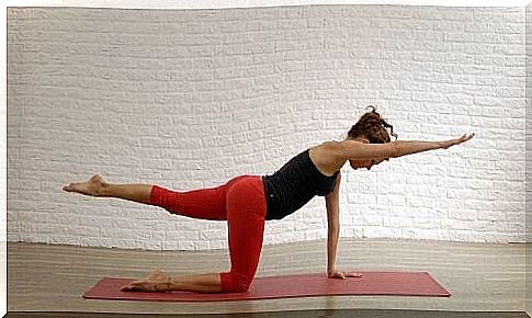 woman doing exercise to strengthen her back