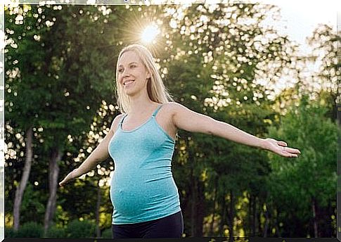 Pregnant woman in the woods