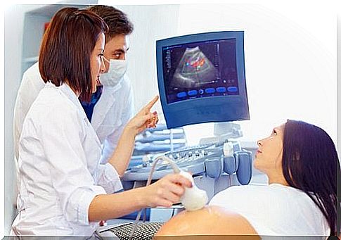 Pregnant woman on examination