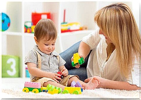 mom playing with toddler