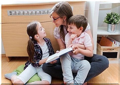 Mom reads to two children