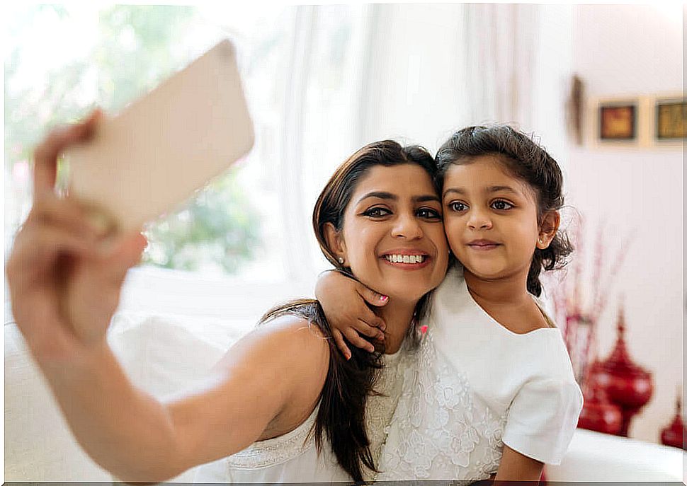 motherhood: mother and child taking selfie