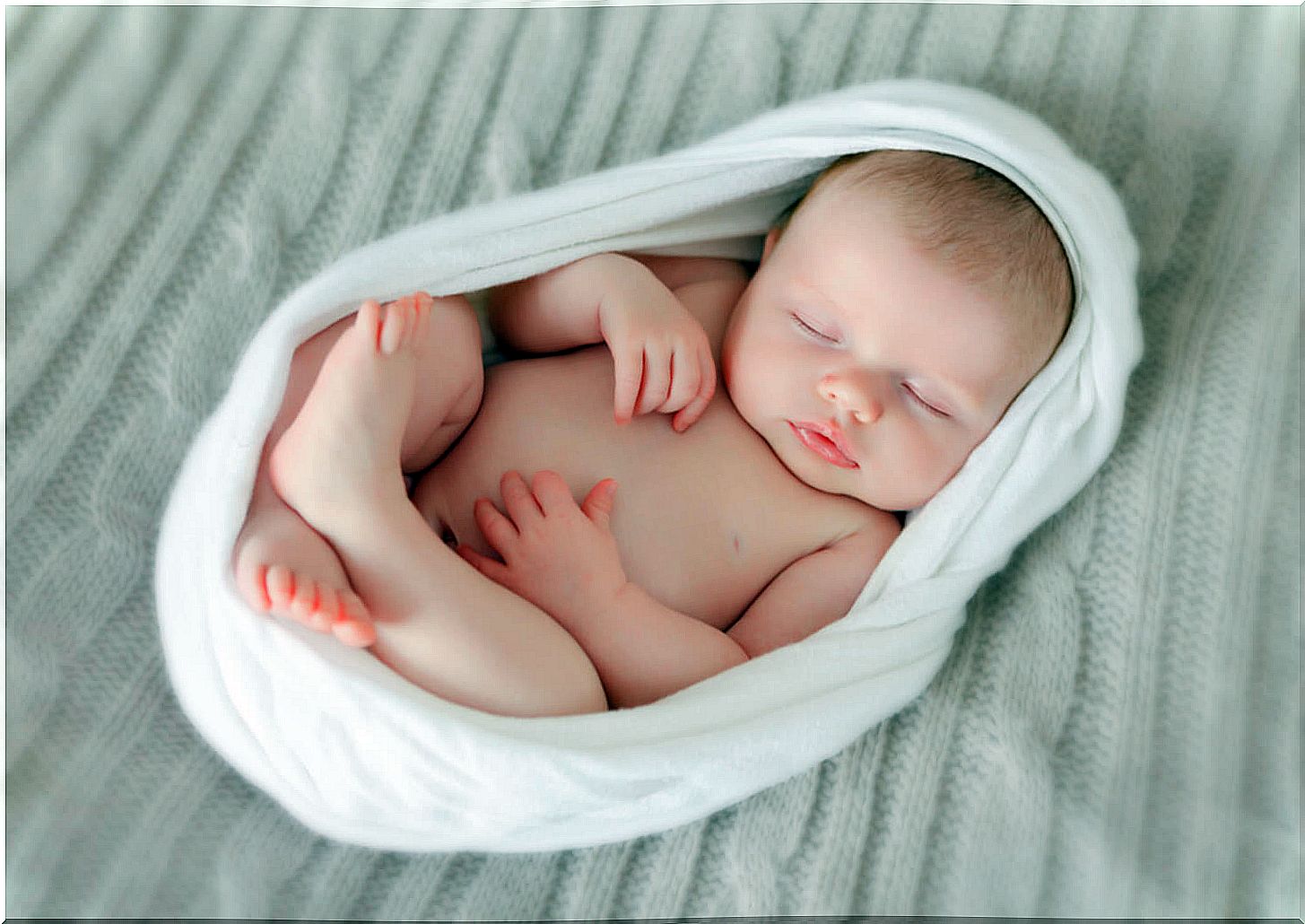 newborn babies sleep a lot and wake up often