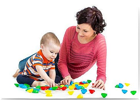 mother and baby playing with toys