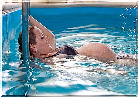 Pregnant woman swimming