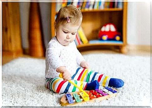 emotional bands and musical instruments: baby with xylophone