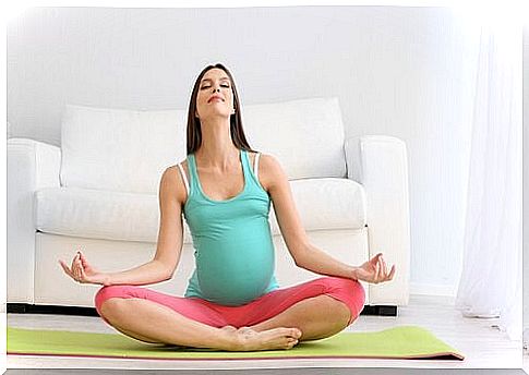 Mother in yoga position