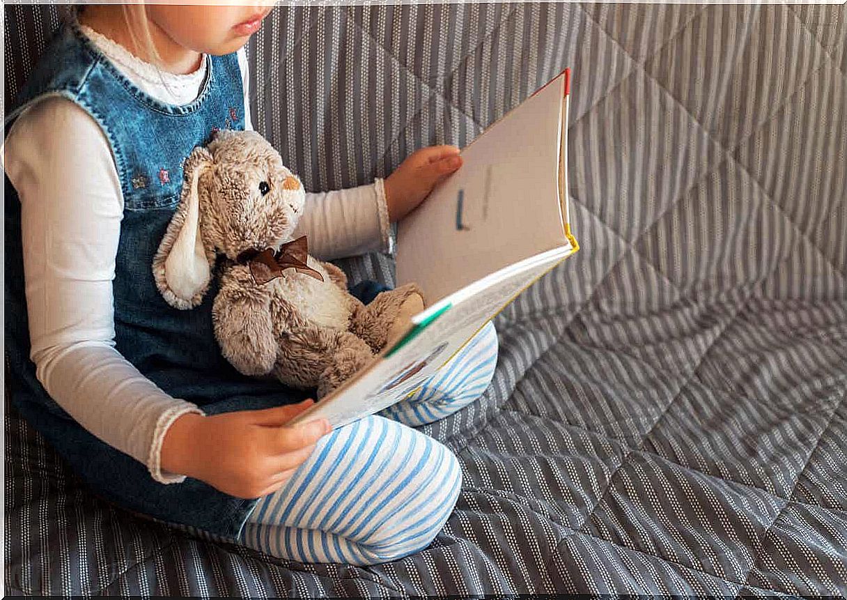 A girl reading a book.