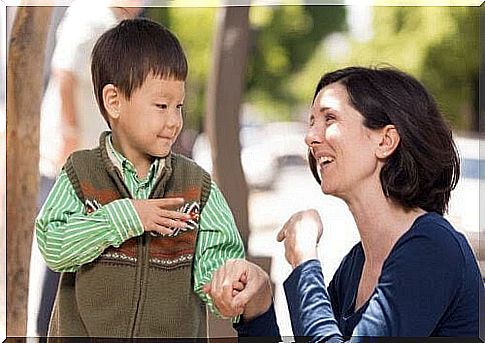 deafness and hearing loss: mother and son speak sign language