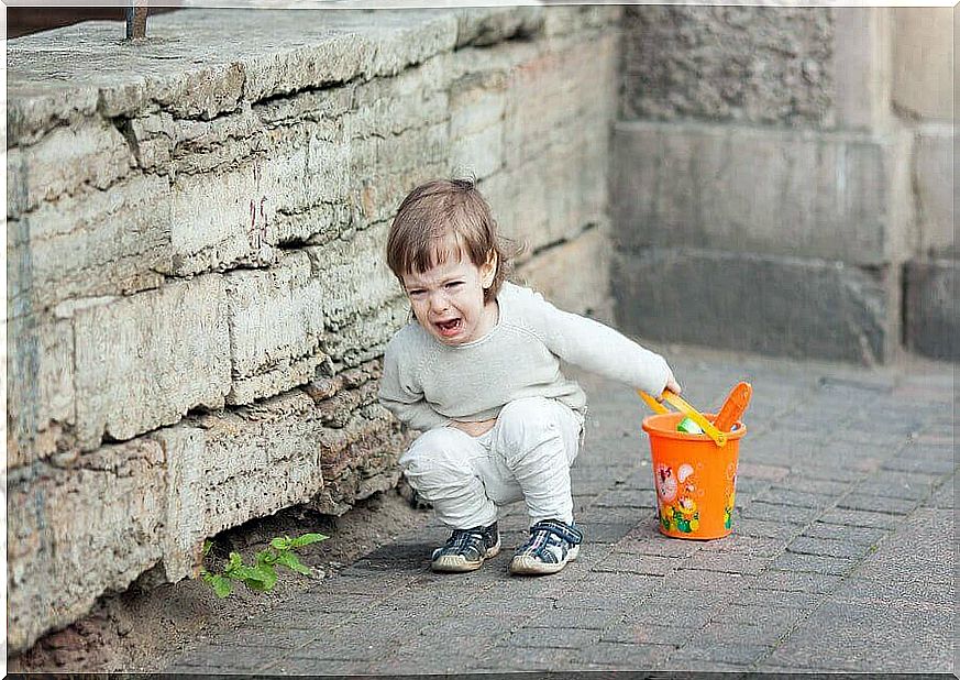 Children screaming holding bucket