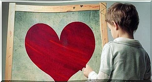 children at blackboard with heart